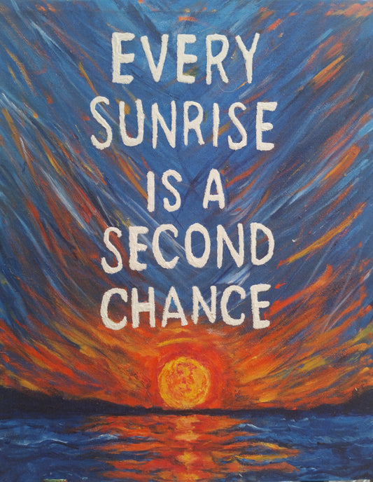 Inspirational sunrise painting with quote Every Sunrise Is a Second Chance in bold white letters on vibrant blue and orange sky over ocean