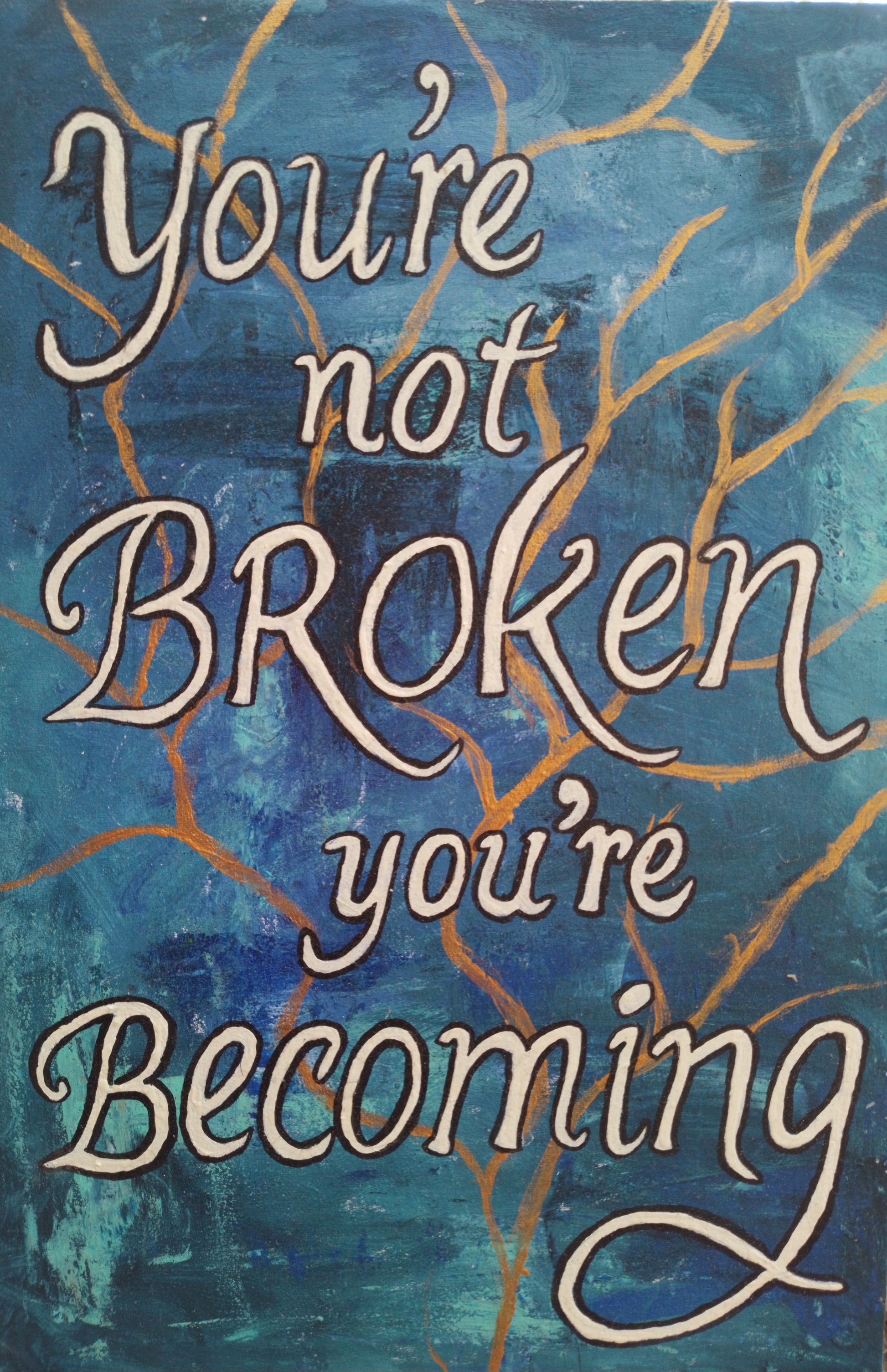 Front view of abstract expressionism painting with quote: ‘You’re not broken, you’re becoming.’ Blue textured background with golden cracks inspired by kintsugi art.”