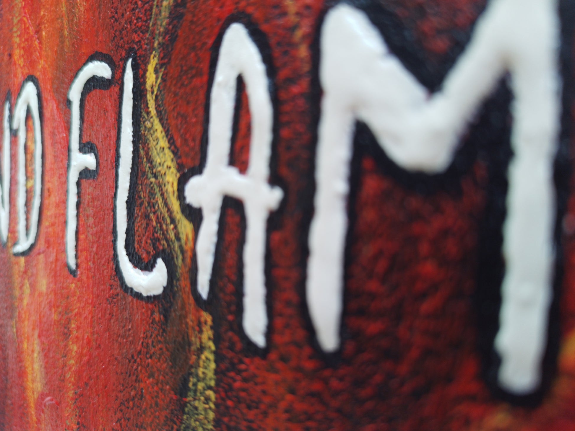 Close-up of glowing paint texture in Pain and Flame acrylic canvas painting