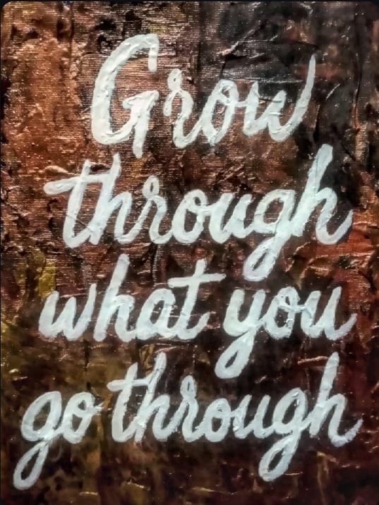 “Time-lapse video showing the making process of glow in the dark expressionism painting with quote ‘Grow Through What You Go Through.’